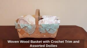 Woven-Wood-Basket-with-Crochet-Trim-and-Assorted-Doilies