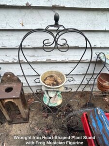 Wrought-Iron-Heart-Shaped-Plant-Stand-with-Frog-Musician-Figurine