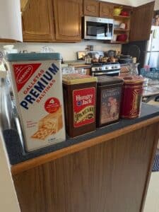 Collection-of-Vintage-Tins-Nabisco-Premium-Saltinas-Hungry-Jack-Pancake-Mix-Cadburys-Milk-Chocolate-Velvet-Pipe-and-Cigarette-Tobacco