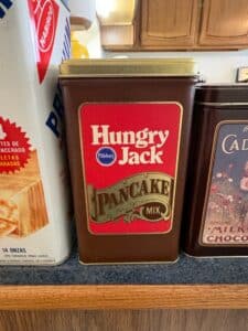 Collection-of-Vintage-Tins-Nabisco-Premium-Saltinas-Hungry-Jack-Pancake-Mix-Cadburys-Milk-Chocolate-Velvet-Pipe-and-Cigarette-Tobacco-third-image