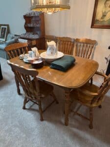 Oak-Finish-Farmhouse-Style-Dining-Set-with-Four-Spindle-Back-Chairs