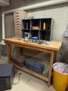 Vintage-Workbench-with-Assorted-Tools-and-Motor-second-image