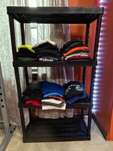 Gracious-Living-Tier-Black-Plastic-Shelving-Unit-with-Folded-Clothing