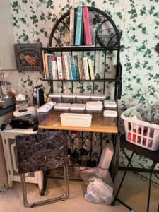 Bakers-Rack-with-Storage-Containers-and-Cookbooks