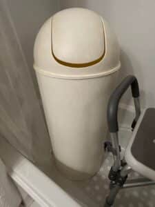 Cream-Colored-Plastic-Swing-Top-Trash-Can