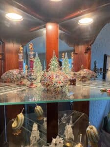 Pulaski-Furniture-Cherry-Corner-Curio-Cabinet-with-Decorative-Glassware-and-Porcelain-second-image