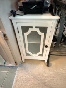 White-Corner-Cabinet-with-Decorative-Geometric-Glass-Door