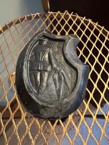 Antique-Cast-Iron-Trivet-with-Figural-Scene-and-Damage