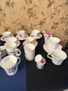 Assorted-Vintage-Porcelain-Teacup-Saucer-and-Mug-Collection-with-Commemorative-Plate-second-image