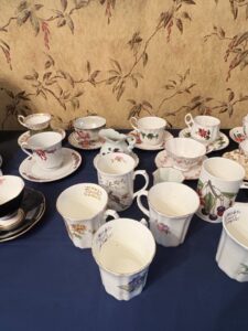 Assorted-Vintage-Porcelain-Teacup-Saucer-and-Mug-Collection-with-Commemorative-Plate-third-image
