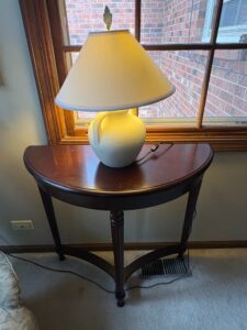 Traditional-Demi-Lune-Console-Table-and-Ceramic-Jug-Lamp