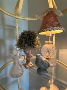 Victorian-Style-Crystal-Decanter-Lamp-with-Button-Adorned-Shade-Distressed-Urn-and-Bird-Figurine