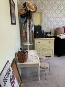Vintage-Vanity-Table-with-Ornate-Wire-Chairs