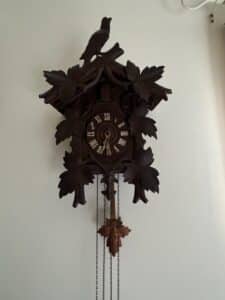 Antique-Black-Forest-Cuckoo-Clock-with-Bird-and-Leaf-Motif