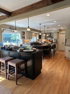 Transitional-Kitchen-Island-with-Pendant-Lights-and-Counter-Stools