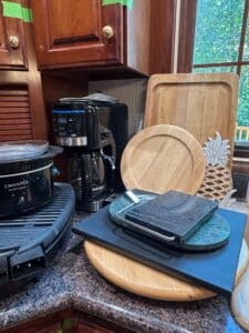 Kitchenware-Assortment-Cuisinart-Coffee-Maker-Crock-Pot-and-Serving-Boards