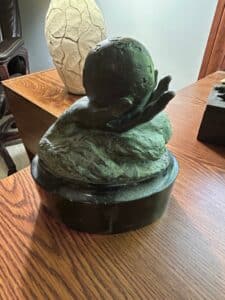 Mara-Dominioni-Bronze-Sculpture-World-in-Hand