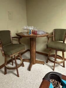 Mikhail-Darafeev-Swivel-Bar-Stools-and-Octagonal-Game-Table