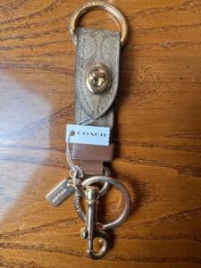 Coach-Trigger-Snap-Bag-Charm-in-Signature-Canvas