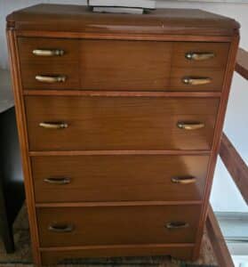 11002