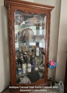 Antique-Carved-Oak-Curio-Cabinet-with-Assorted-Collectibles-1