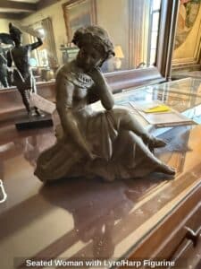Seated-Woman-with-Lyre-or-Harp-Figurine