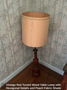 Vintage-Red-Turned-Wood-Table-Lamp-with-Hexagonal-Details-and-Peach-Fabric-Shade