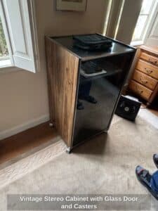 Vintage-Stereo-Cabinet-with-Glass-Door-and-Casters