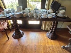 Collection-of-Porcelain-Dinnerware-and-Teaware-on-Barley-Twist-Table