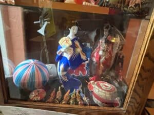 Assorted-Japanese-Dolls-and-Collectibles-Display-Cabinet-second-image