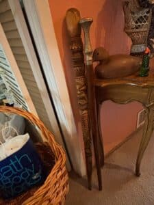 Carved-Wooden-Walking-Stick-with-Metal-Handle-and-Decorative-Carvings-second-image