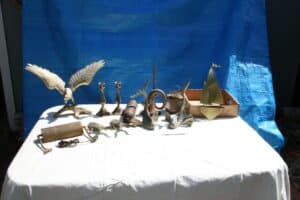 Collection-of-Brass-Decorative-Objects-including-Eagle-Sailboat-and-Fish-1