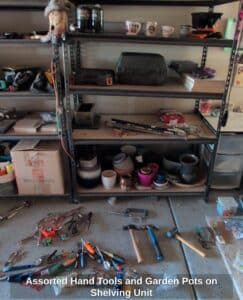 Assorted-Hand-Tools-and-Garden-Pots-on-Shelving-Unit