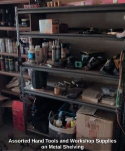 Assorted-Hand-Tools-and-Workshop-Supplies-on-Metal-Shelving