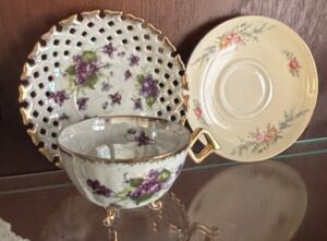 Assorted-Vintage-Porcelain-Teacups-and-Saucers-with-Floral-Motifs-second-image