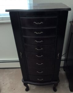 Dark-Wood-Jewelry-Armoire-with-Ornate-Drawer-Pulls