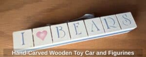 Hand-Carved-Wooden-Toy-Car-and-Figurines-third-image