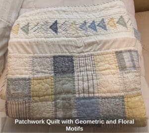 Patchwork-Quilt-with-Geometric-and-Floral-Motifs