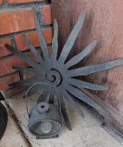 Rustic-Metal-Sunburst-Wall-Decor-with-Lantern