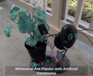 Whimsical-Ant-Planter-with-Artificial-Geraniums