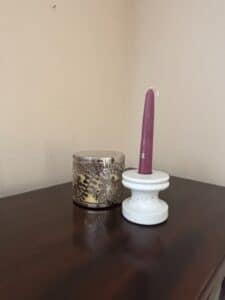 White-Ceramic-Candle-Holder-with-Purple-Taper-Candle