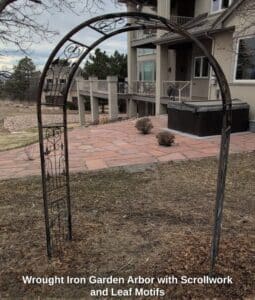 Wrought-Iron-Garden-Arbor-with-Scrollwork-and-Leaf-Motifs