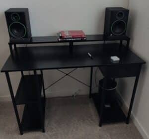 Black-Metal-Computer-Desk-with-Elevated-Shelf-and-Side-Shelves