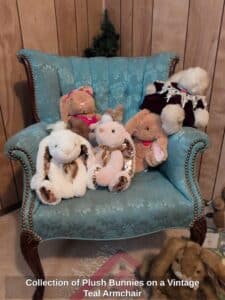 Collection-of-Plush-Bunnies-on-a-Vintage-Teal-Armchair-second-image