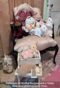 Collection-of-Stuffed-Bunnies-and-a-Teddy-Bear-on-a-Victorian-style-Chair-including-Wendy-Brent-and-Russ-brands