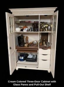 Cream-Colored-Three-Door-Cabinet-with-Glass-Panes-and-Pull-Out-Shelf-second-image
