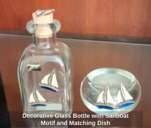 Decorative-Glass-Bottle-with-Sailboat-Motif-and-Matching-Dish