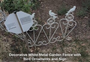 Decorative-White-Metal-Garden-Fence-with-Bird-Ornaments-and-Sign