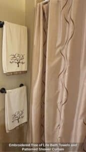 Embroidered-Tree-of-Life-Bath-Towels-and-Patterned-Shower-Curtain