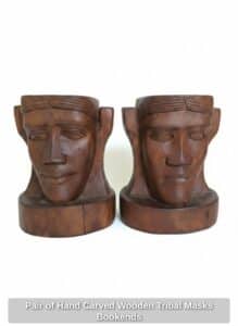 Pair-of-Hand-Carved-Wooden-Tribal-Masks-Bookends
